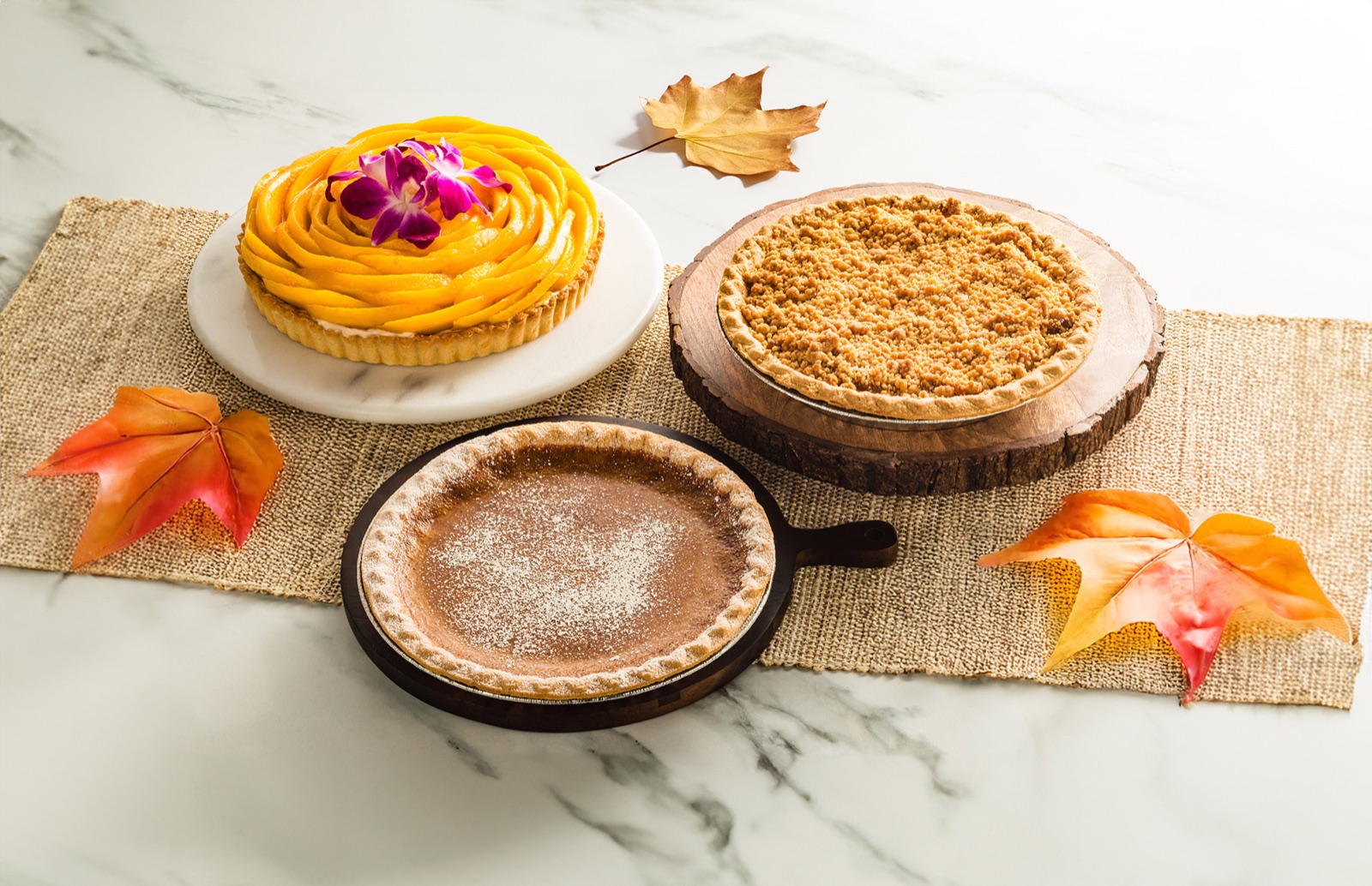 Whole pies, tarts and cakes baked in-house